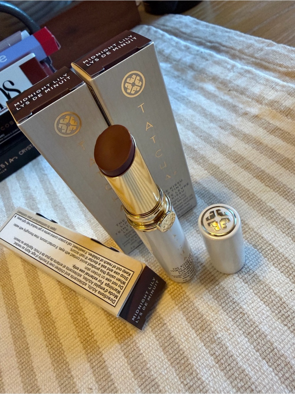 Tatcha Satin Lipstick in Deep Brown Plum with Gold Accents